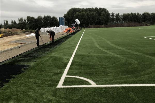 Aanleg kunstgras voetbalveld en omgevingswerken - Sportinfrabouw NV